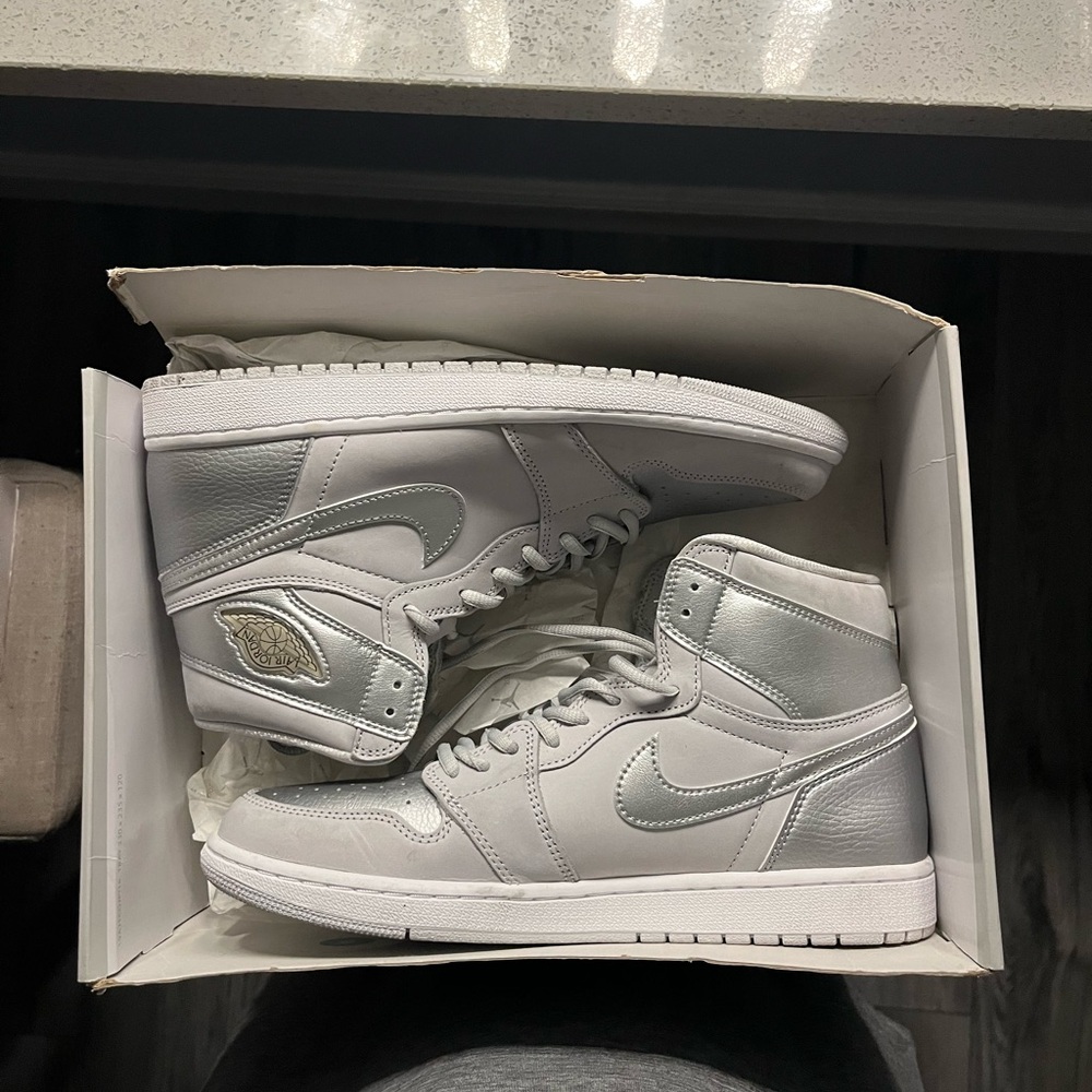 Jordan Sneakers in Gray and Silversilver & white Jordan 1’s $100
